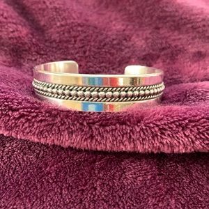 Silver Navajo cuff bracelet, stamped “Ron Y. Sterling”